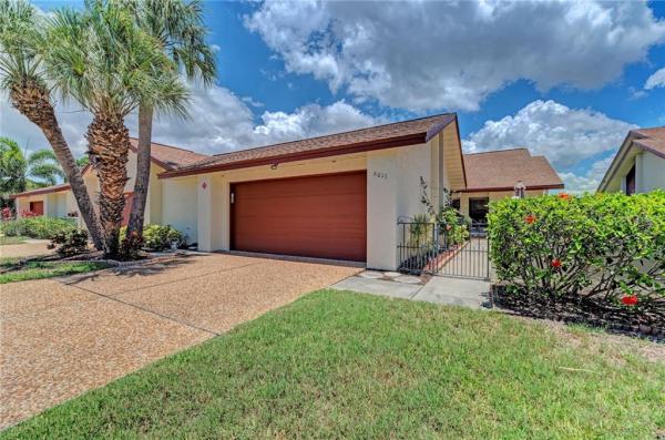 RACQUET CLUB VILLAS CONDO AMD