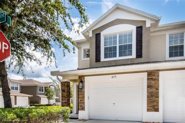 CARRIAGE HOMES AT DUNWOODY COMMONS A CONDO