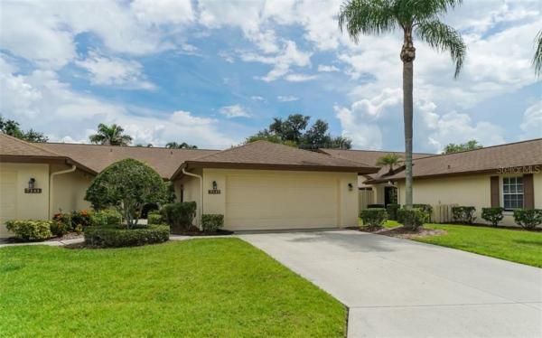 WOODLAKE VIILAS AT PALM AIRE PH IX