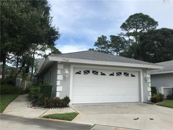 CLUB VILLAS AT PALM AIRE PH I