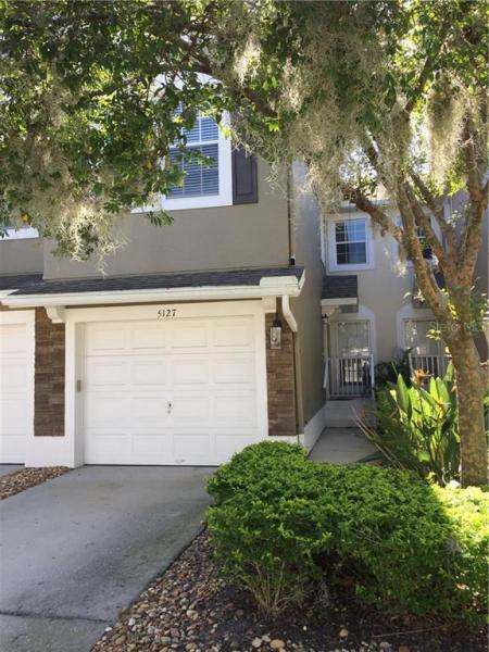 CARRIAGE HOMES AT DUNWOODY COMMONS A CONDO