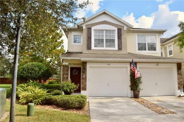 CARRIAGE HOMES AT DUWOODY COMMONS A CONDO