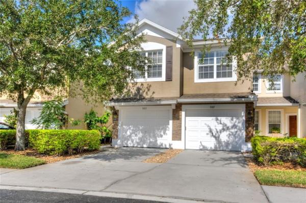 CARRIAGE HOMES AT DUNWOODY COMMONS A CONDO