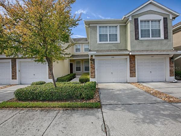 CARRIAGE HOMES AT DUNWOODY COMMONS A CONDO