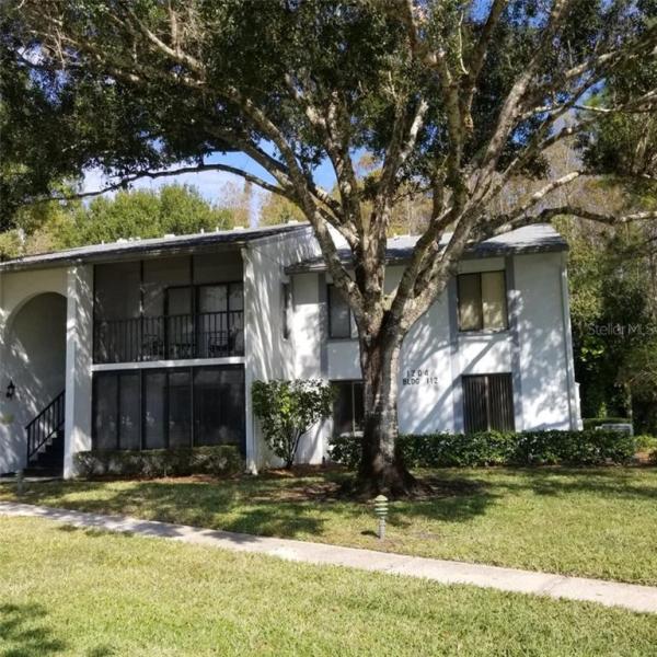 PINE RIDGE AT LAKE TARPON VILLAGE