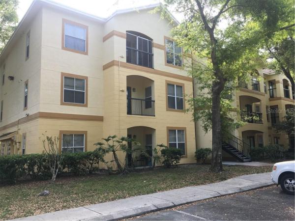 PINNACLE AT CARROLLWOOD A CONDO