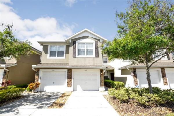 CARRIAGE HOMES AT DUNWOODY COMMONS A CONDO