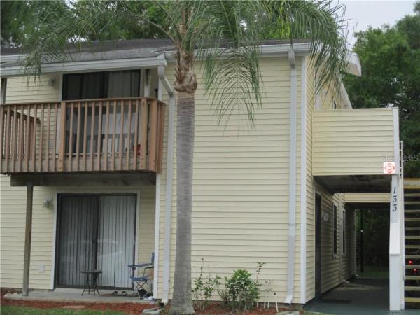 GARDENS OF FOREST LAKES CONDO THE