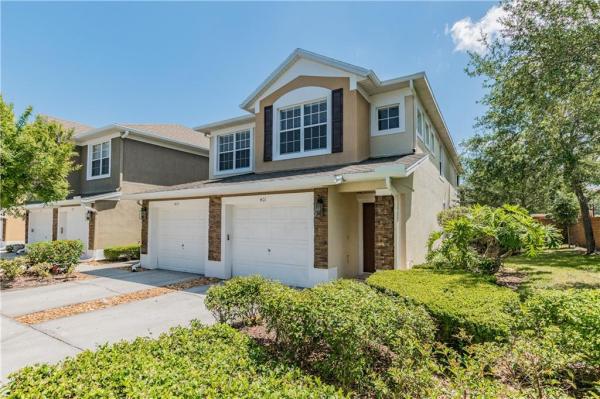 CARRIAGE HOMES AT DUNWOODY COMMONS A CONDO