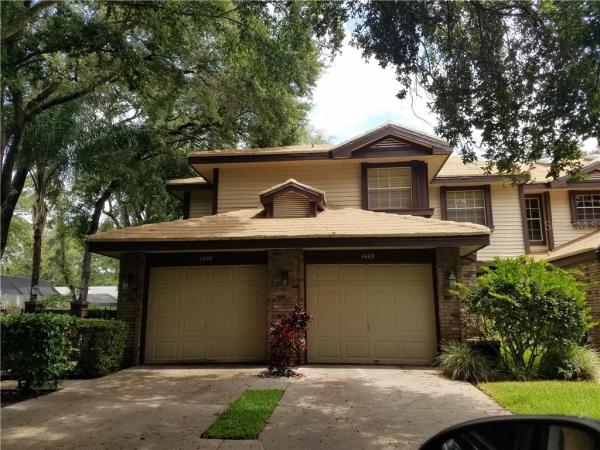 LAUREL OAKS AT COUNTRY WOODS CONDO