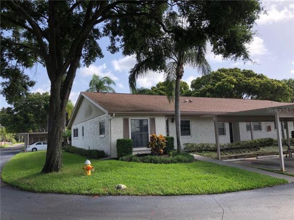 WOODLAND VILLAS CONDO 1