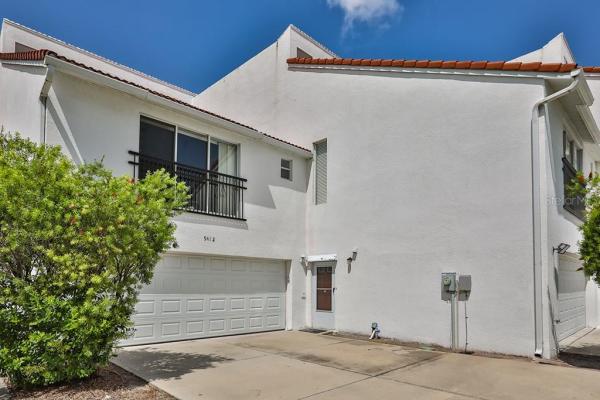 NEW TRIAD TWNHMS OF CARROLLWOOD