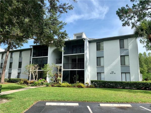 PINE RIDGE AT LAKE TARPON VILLAGE