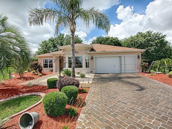 SPRUCE CREEK GOLF & COUNTRY CLUB SAWGRASS 03 & REP