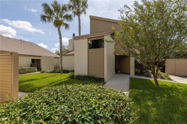 CARROLLWOOD VILLAGE PINE LAKE