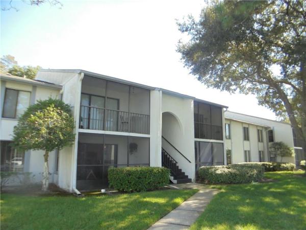 PINE RIDGE AT LAKE TARPON VILLAGE