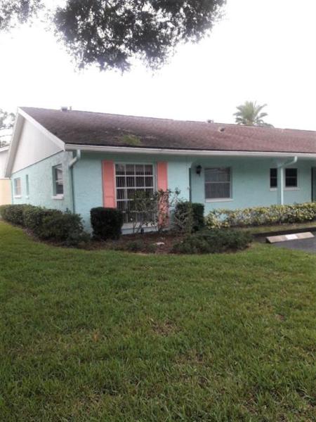 WOODLAND VILLAS CONDO 1