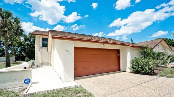 RACQUET CLUB VILLAS CONDO AMD