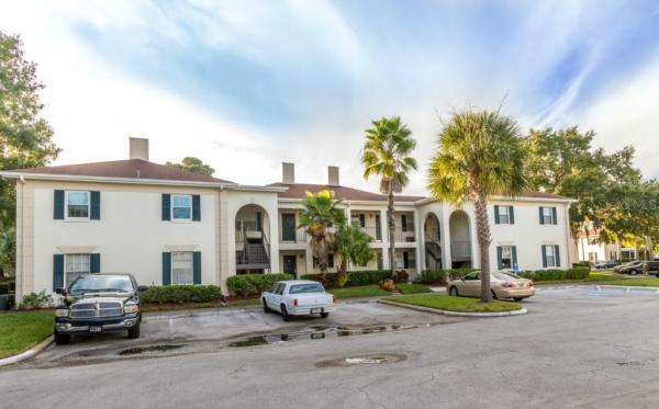 GRAND AT OLDE CARROLLWOOD CONDO