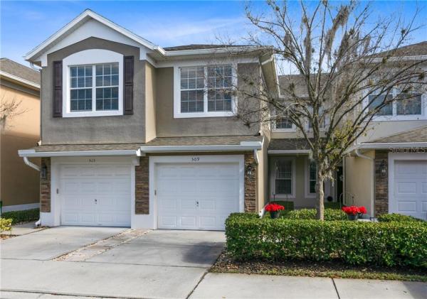 CARRIAGE HOMES AT DUNWOODY COMMONS A CONDO