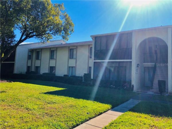 PINE RIDGE AT LAKE TARPON VILLAGE