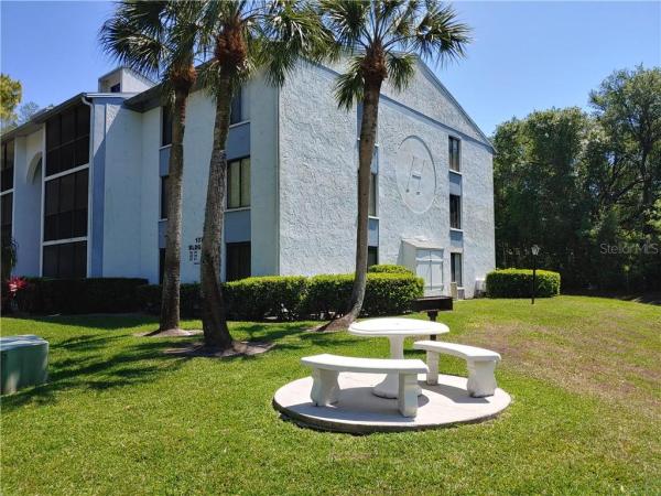 PINE RIDGE AT LAKE TARPON VILLAGE