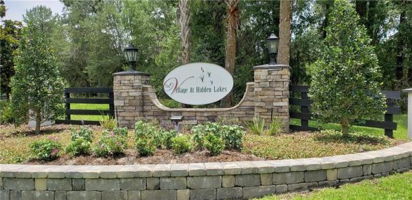 VILLAGE AT HIDDEN LAKES