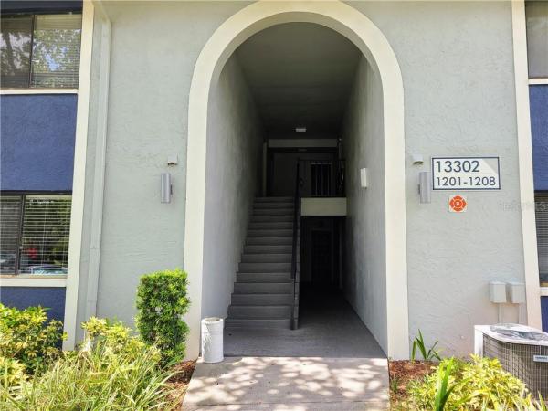 WHISPERING PALMS CONDO