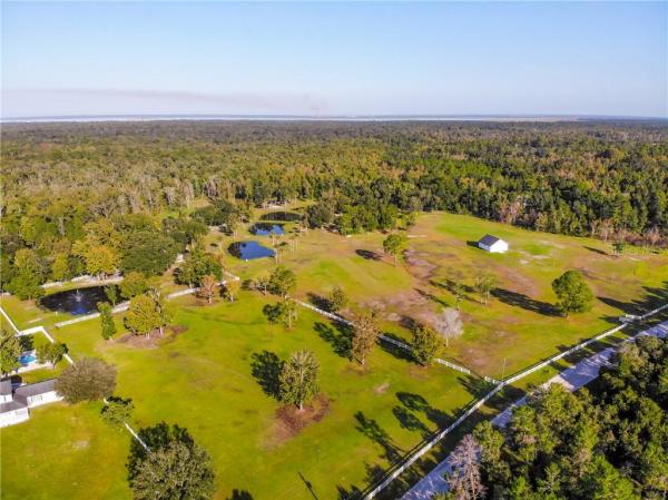 GENOVA WOODS SEC 2 5 ACRE DEV