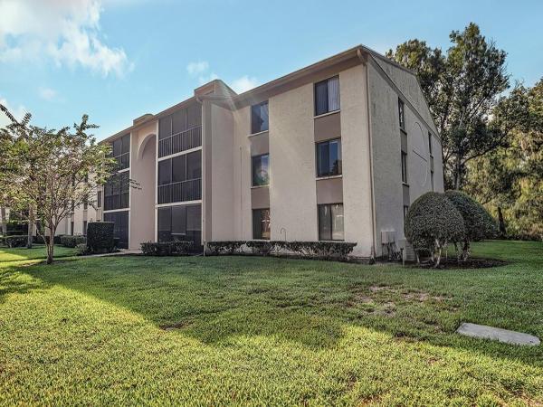 PINE RIDGE AT LAKE TARPON VILLAGE