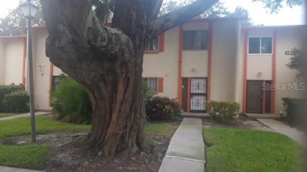 WHISPER WOODS TOWNHOMES CONDO