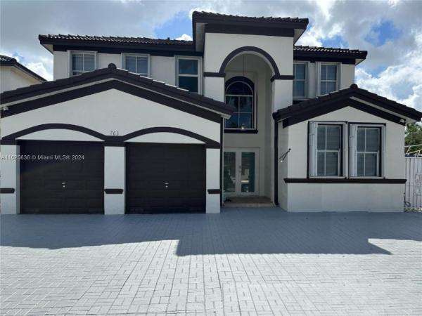 SHOMA HOMES AT TAMIAMI IV