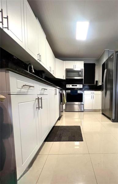 Palm East Gardens Condo