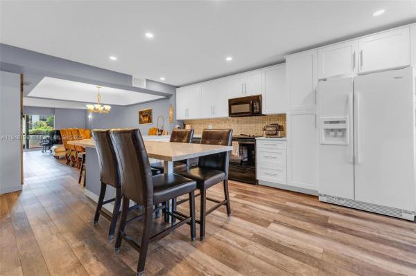 PINES OF BOCA BARWOOD