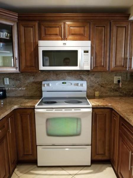 500 THREE ISLANDS BLVD #414, HALLANDALE BEACH, FL 33009