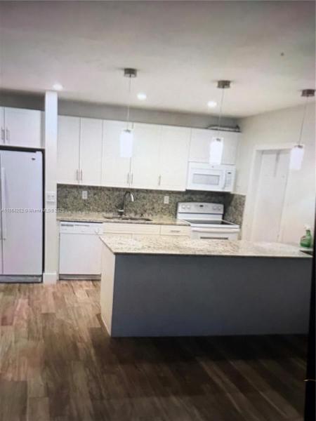 RESIDENCES AT THE FALLS C