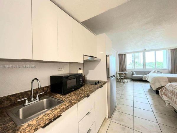 19201 COLLINS AVE #303, SUNNY ISLES BEACH, FL 33160