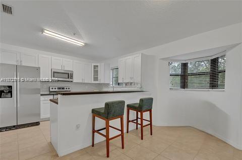 THE COURTS AT BAYSHORE II