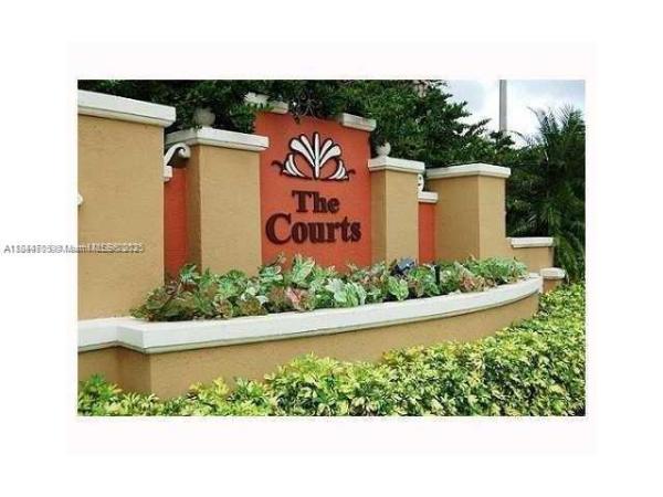 THE COURTS AT DORAL ISLES