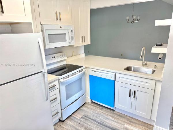 NAPOLI GARDENS AT CORAL S