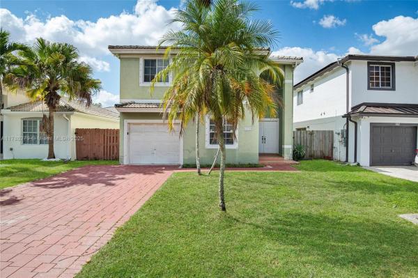 CHRISTINA AT THE HAMMOCKS