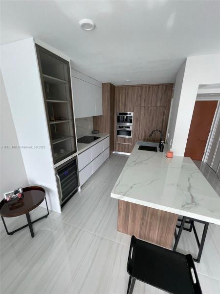 BRICKELL ON THE RIVER N T