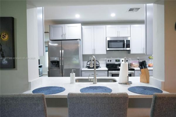 MAINLANDS OF TAMARAC LAKE