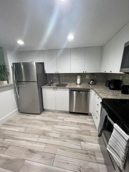 BUILDING THREE OF RACQUET