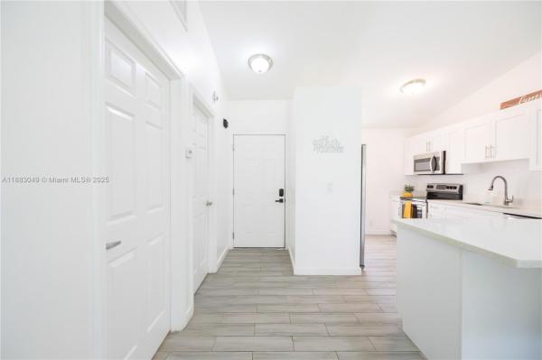 SUGAR POND MANOR OF WELLI