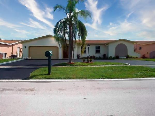 SUNRISE GOLF VILLAGE SEC