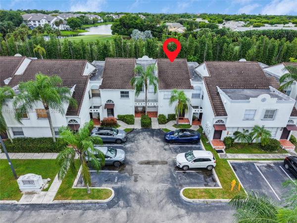 THE GREENS AT DORAL CONDO