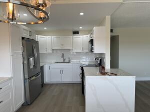 WOLVERTON AT CENTURY VILLAGE CONDO