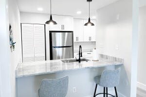 BEACH VILLAS ON HUTCHINSON ISLAND CONDOMINIUM